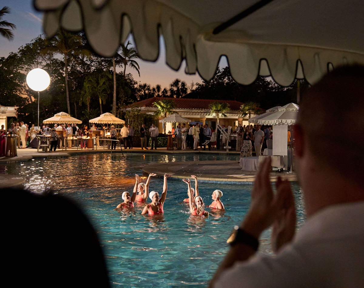 Ritz poolside aqua show group meeting